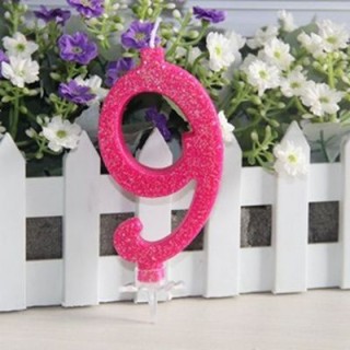 Candelina di cera  numero 9 di colore fucsia con brillantini incorporati   pz 1