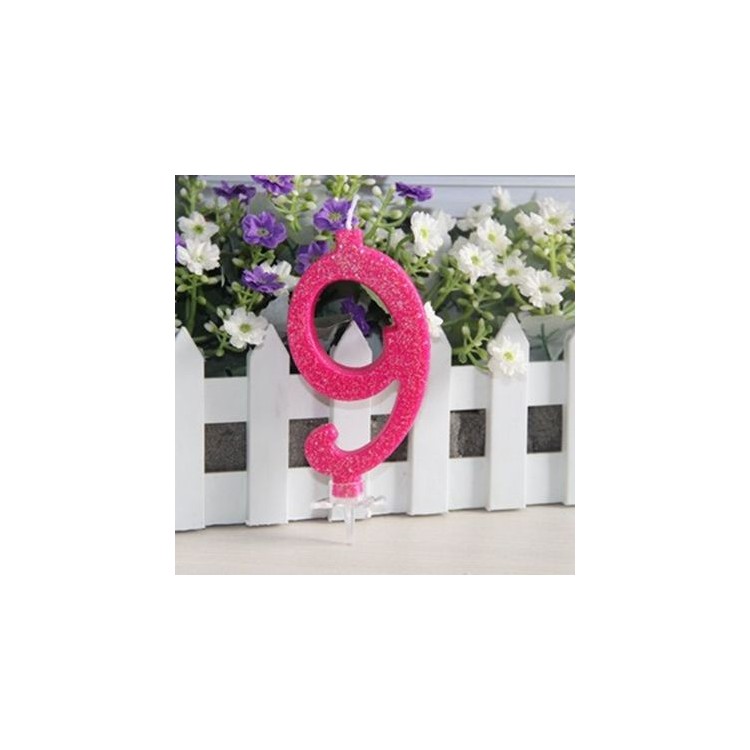 Candelina di cera  numero 9 di colore fucsia con brillantini incorporati   pz 1