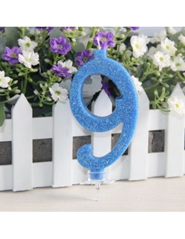 Candelina di cera  numero 9 di colore blù con brillantini incorporati   pz 1